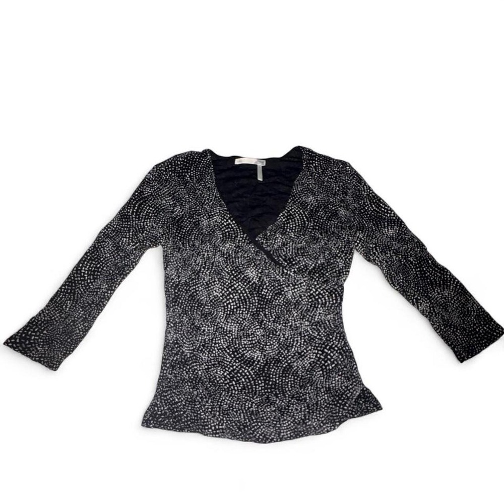 Black & white polka dot blouse with 3/4 sleeves and a V-neckline, size S
